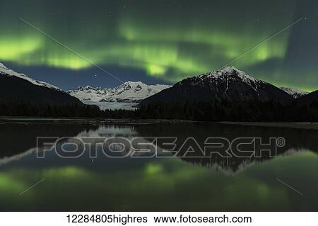 Northern Lights over Mendenhall Lake and Tongass National Forest, Juneau, Southeast Alaska View Large Photo Image Stock Photograph - Northern Lights over Mendenhall Lake and Tongass National Forest, Juneau, Southeast Alaska. Fotosearch