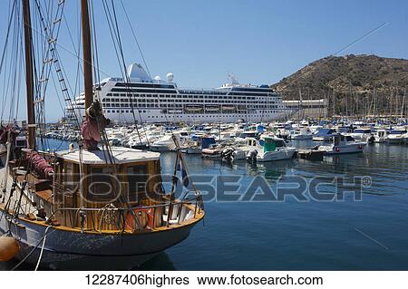 Stock Photograph - Oceania cruise ship in port; Cartagena, Spain. Fotosearch