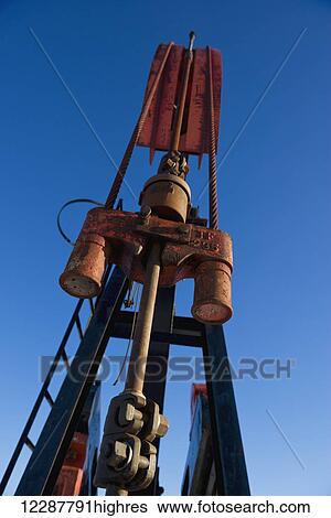 Oil pump jack; Morinville, Alberta, Canada View Large Photo Image Stock Photograph - Oil pump jack; Morinville, Alberta, Canada. Fotosearch