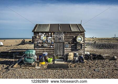 Old wooden fishing shed on a shingle beach; Dungeness, Kent, England View Large Photo Image Stock Photo - Old wooden fishing shed on a shingle beach; Dungeness, Kent, England. Fotosearch