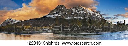 Stock Photograph - Panoramic scenic of Mt. Sukakpak at sunset along the Middle Fork of the Koyukuk River in the Brooks Range, Arctic Alaska, Autumn. Fotosearch