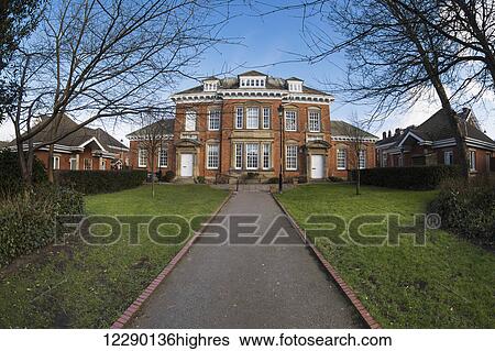 Stock Photograph - Path leading to a large house with two entrances; South Shields, Tyne and Wear, England. Fotosearch