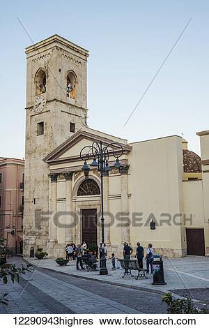 People standing outside a church building; Cagliari, Sardinia, Italy View Large Photo Image Stock Photograph - People standing outside a church building; Cagliari, Sardinia, Italy. Fotosearch