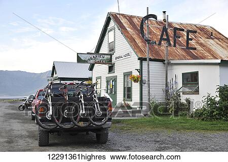 Stock Photograph - Pick up truck with mountain bikes in the back is parked next to the Seaview Cafe in Hope, South-central Alaska, summer. Fotosearch