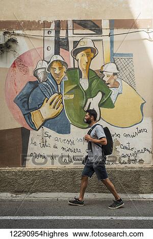 Stock Photograph - Political paintings known as murales; Orgosolo, Sardinia, Italy. Fotosearch