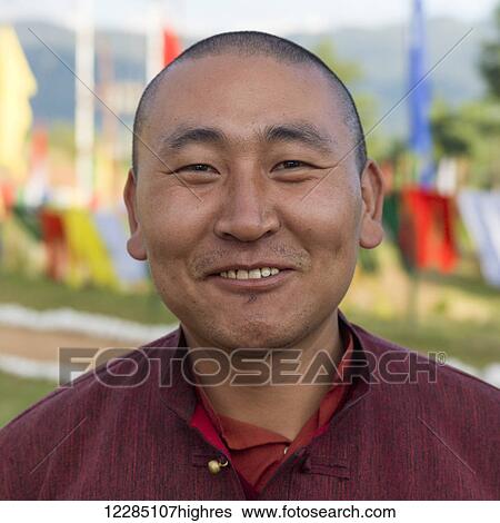 Stock Photograph - Portrait of a monk, Sangchen Choeker Buddhist Institute; Paro, Bhutan. Fotosearch