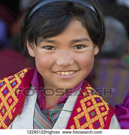 Portrait of a smiling young girl; Paro, Bhutan View Large Photo Image Stock Photograph - Portrait of a smiling young girl; Paro, Bhutan. Fotosearch