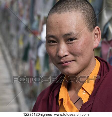 Stock Photograph - Portrait of a young monk; Paro, Bhutan. Fotosearch