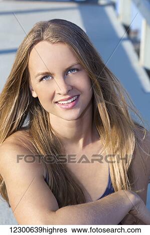Portrait of a young woman with long blond hair; Los Angeles, California, United States of America View Large Photo Image Stock Photograph - Portrait of a young woman with long blond hair; Los Angeles, California, United States of America. Fotosearch