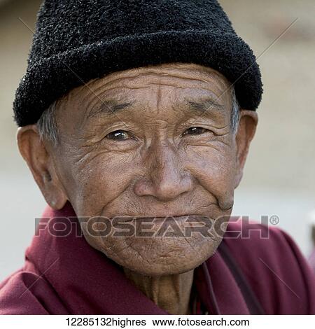 Stock Photograph - Portrait of an elderly man; Paro, Bhutan. Fotosearch