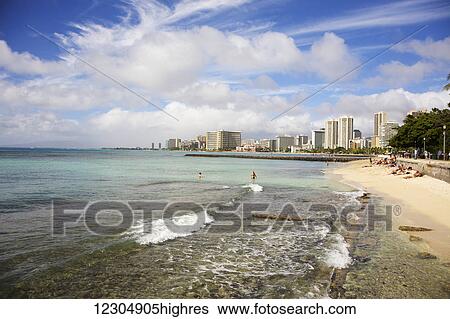 Stock Photograph - Queen's Surf Beach; Oahu, Hawaii, United States of America. Fotosearch