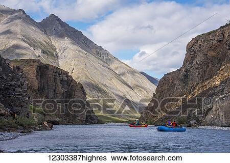 Rafters among canyon walls on the Marsh Fork of the Canning River in the Arctic National Wildlife Refuge, Summer, Alaska View Large Photo Image Stock Photograph - Rafters among canyon walls on the Marsh Fork of the Canning River in the Arctic National Wildlife Refuge, Summer, Alaska. Fotosearch