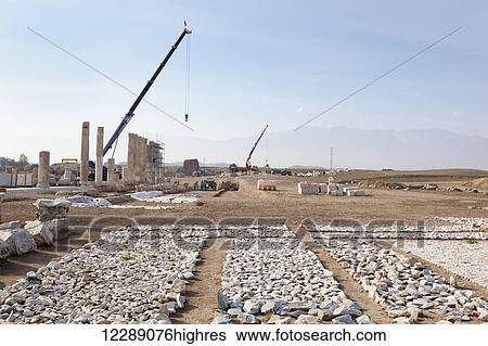 Stock Photograph - Rebuilding of Laodicea which has gone on for years, with spectacular ruins to visit; Laodicea, Turkey. Fotosearch