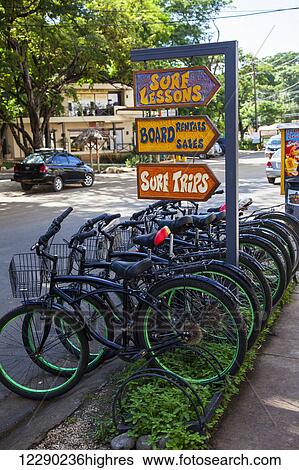 Stock Photograph - Rental bicycles; Tamarindo, Costa Rica. Fotosearch