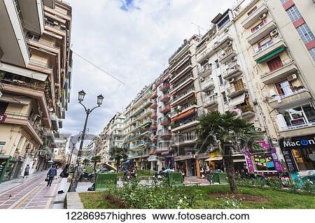 Stock Photograph - Residential buildings and retail shops; Thessaloniki, Greece. Fotosearch