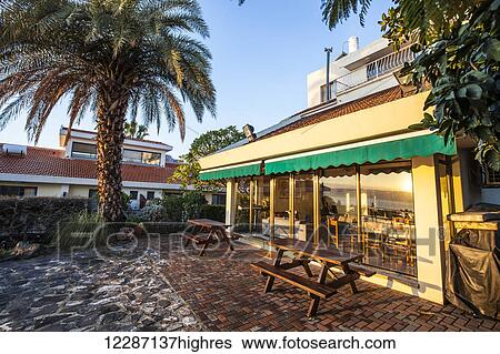 Restaurant and outdoor patio seating; Migdal, Israel View Large Photo Image Stock Photograph - Restaurant and outdoor patio seating; Migdal, Israel. Fotosearch