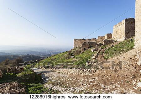 Rocky dirt path and ruined buildings on a mountain; Corinth, Greece View Large Photo Image Stock Photograph - Rocky dirt path and ruined buildings on a mountain; Corinth, Greece. Fotosearch