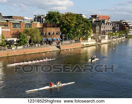 Stock Photograph - Rowing down the river at Kingston upon Thames; Surrey, England. Fotosearch