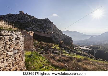 Stock Photograph - Ruined buildings on a mountain; Corinth, Greece. Fotosearch
