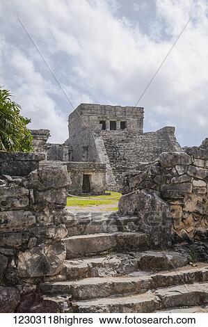 Stock Photograph - Ruins of a stone building and steps, Riviera Maya; Tulum, Quintana Roos, Mexico. Fotosearch