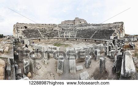 Stock Photograph - Ruins of an amphitheatre; Miletus, Turkey. Fotosearch
