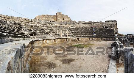Stock Photograph - Ruins of an amphitheatre; Miletus, Turkey. Fotosearch