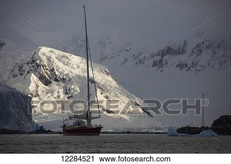 Sailboat at Yelcho/Videla Base (Chile) in Paradise Harbour, Antarctic Peninsula; Antarctica View Large Photo Image Stock Image - Sailboat at Yelcho/Videla Base (Chile) in Paradise Harbour, Antarctic Peninsula; Antarctica. Fotosearch