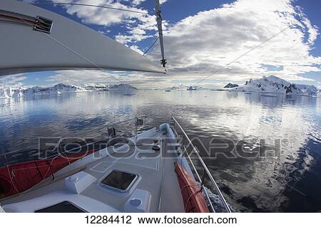 Sailboat in Gerlache Strait, Antarctic Peninsula; Antarctica View Large Photo Image Stock Image - Sailboat in Gerlache Strait, Antarctic Peninsula; Antarctica. Fotosearch