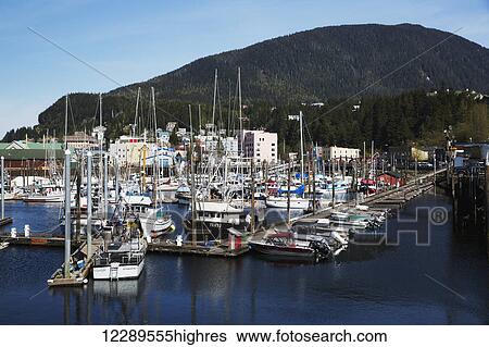 Sailboats and fishing boats docked in Ketchikan's harbor, Southeast Alaska, Spring View Large Photo Image Stock Photograph - Sailboats and fishing boats docked in Ketchikan's harbor, Southeast Alaska, Spring. Fotosearch