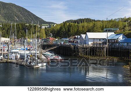 Sailboats and fishing boats docked in Ketchikan's harbor along Creek Street, Southeast Alaska, Spring View Large Photo Image Stock Photograph - Sailboats and fishing boats docked in Ketchikan's harbor along Creek Street, Southeast Alaska, Spring. Fotosearch