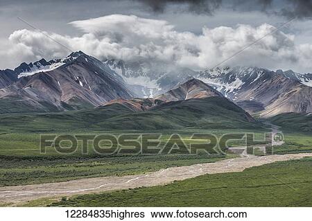 Scenic view of Polychrome Pass and the Alaska Range, Denali National Park and Preserve, Interior Alaska, summer View Large Photo Image Stock Photograph - Scenic view of Polychrome Pass and the Alaska Range, Denali National Park and Preserve, Interior Alaska, summer. Fotosearch