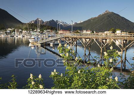 Scenic view of the pier in Sitka Harbor and the mountains in the background, Southeast Alaska, USA, Summer View Large Photo Image Stock Photograph - Scenic view of the pier in Sitka Harbor and the mountains in the background, Southeast Alaska, USA, Summer. Fotosearch