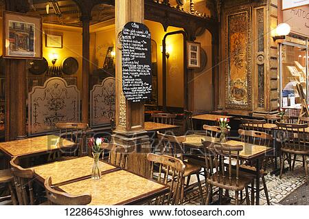 Stock Photograph - Seating in a typical cafe; Paris, France. Fotosearch