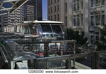 Seattle Center Monorail Skytrain arrives at Westlake Centre station; Seattle, Washington, United States of America View Large Photo Image Stock Image - Seattle Center Monorail Skytrain arrives at Westlake Centre station; Seattle, Washington, United States of America. Fotosearch