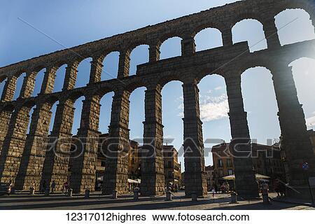 Segovia's Aqueduct is one of the architectural symbols of Spain, built in the 2nd Century A. D; Segovia city, Castilla Leon, Spain View Large Photo Image Stock Photograph - Segovia's Aqueduct is one of the architectural symbols of Spain, built in the 2nd Century A. D; Segovia city, Castilla Leon, Spain. Fotosearch