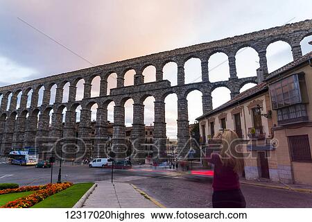 Segovia's Aqueduct is one of the architectural symbols of Spain, built in the 2nd Century A. D; Segovia city, Castilla Leon, Spain View Large Photo Image Stock Photograph - Segovia's Aqueduct is one of the architectural symbols of Spain, built in the 2nd Century A. D; Segovia city, Castilla Leon, Spain. Fotosearch