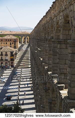 Segovia's Aqueduct is one of the architectural symbols of Spain, built in the 2nd Century A. D; Segovia city, Castilla Leon, Spain View Large Photo Image Stock Photograph - Segovia's Aqueduct is one of the architectural symbols of Spain, built in the 2nd Century A. D; Segovia city, Castilla Leon, Spain. Fotosearch
