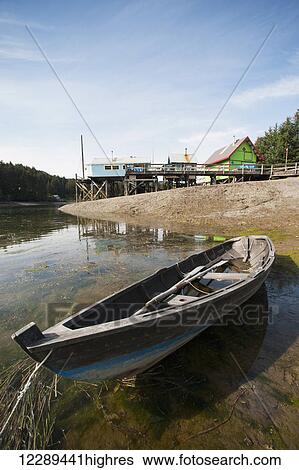 Seldovia Rowing Club boat at low tide on the shore of the Seldovia Slough, Southcentral Alaska, summertime View Large Photo Image Stock Photograph - Seldovia Rowing Club boat at low tide on the shore of the Seldovia Slough, Southcentral Alaska, summertime. Fotosearch