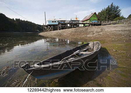 Seldovia Rowing Club boat at low tide on the shore of the Seldovia Slough, Southcentral Alaska, summertime View Large Photo Image Stock Photograph - Seldovia Rowing Club boat at low tide on the shore of the Seldovia Slough, Southcentral Alaska, summertime. Fotosearch