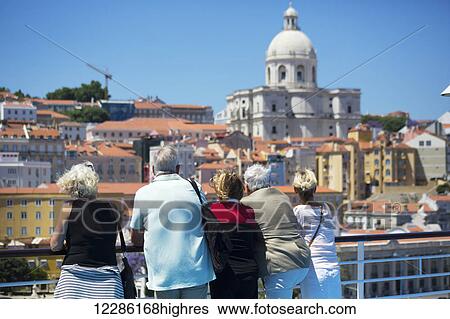 Senior cruise passengers waiting for boat to dock in the Alfama District; Lisbon, Portugal View Large Photo Image Stock Photograph - Senior cruise passengers waiting for boat to dock in the Alfama District; Lisbon, Portugal. Fotosearch