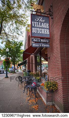 Stock Photograph - Shops along a street in autumn; Woodstock, Vermont, United States of America. Fotosearch