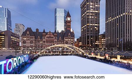Skating at Nathan Phillips Square; Toronto, Ontario, Canada View Large Photo Image Stock Photograph - Skating at Nathan Phillips Square; Toronto, Ontario, Canada. Fotosearch