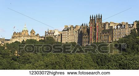 Stock Photograph - Skyline of Old Town against a blue sky; Edinburgh, Scotland. Fotosearch
