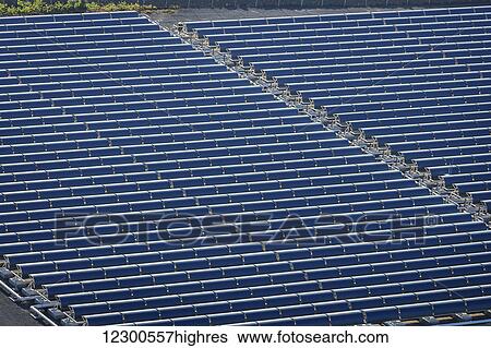 Stock Photograph - Solar panels and electric farm, near Kailua-Kona; Island of Hawaii, Hawaii, United States of America. Fotosearch