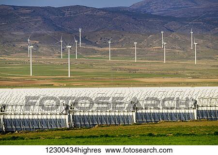 Solar panels and wind turbines; Almeria Province, Spain View Large Photo Image Stock Photograph - Solar panels and wind turbines; Almeria Province, Spain. Fotosearch