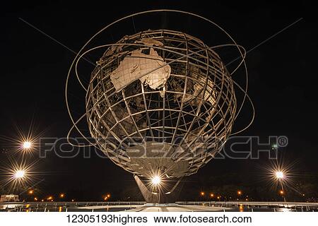 Stock Photograph - Spotlights around the Unisphere at nighttime, Flushing Meadows-Corona Park; Queens, New York, United States of America. Fotosearch