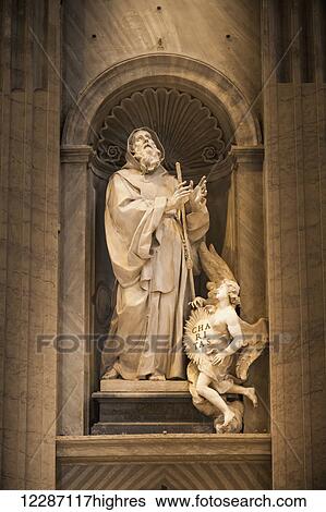 Stock Photograph - Statue in a niche, St. Peter's Basilica; Rome, Italy. Fotosearch
