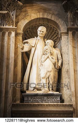 Stock Photograph - Statue in a niche, St. Peter's Basilica; Rome, Italy. Fotosearch