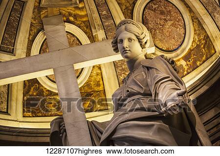 Stock Photograph - Statue of Saint Helena with a cross, St. Peter's Basilica; Rome, Italy. Fotosearch