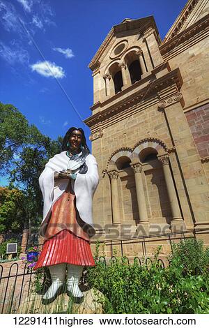 Statue of Saint Kateri Tekakwitha, first North American Indian to be beatified, Cathedral Basilica of St Francis of Assisi; Santa Fe, New Mexico, United States of America View Large Photo Image Stock Photograph - Statue of Saint Kateri Tekakwitha, first North American Indian to be beatified, Cathedral Basilica of St Francis of Assisi; Santa Fe, New Mexico, United States of America. Fotosearch